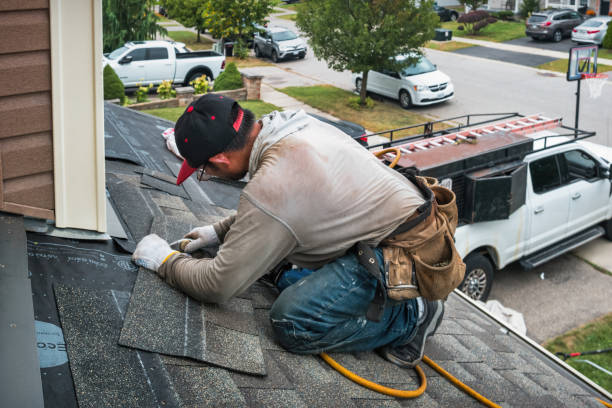 Professional Roofing technician working in Long Beach, NY